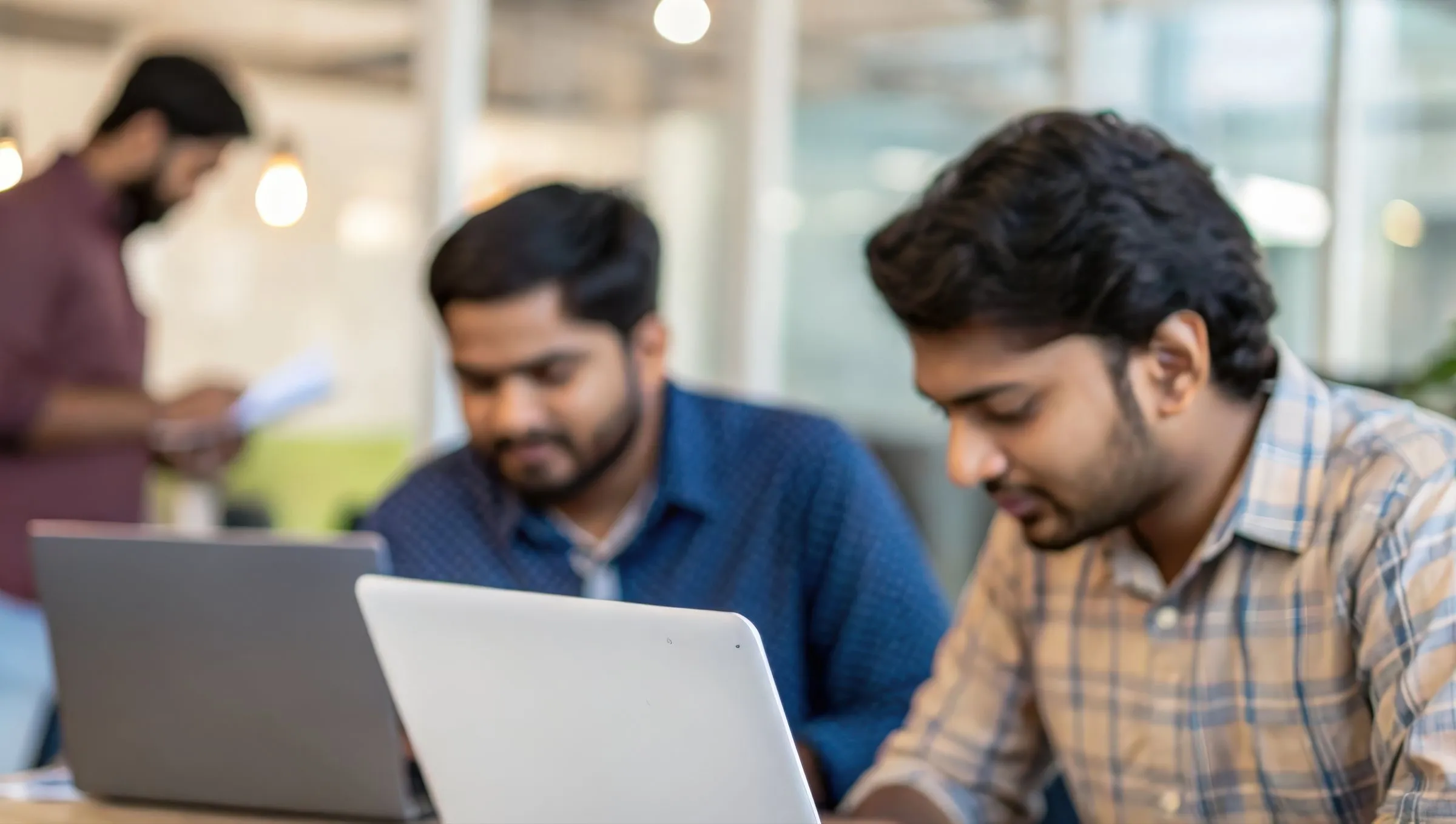 Engineers working through a data migration together